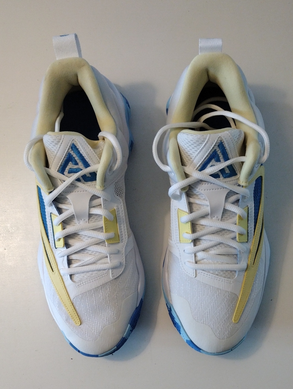 Nike Gianni's Immortality Men's Sneakers in White with Blue & Yellow Accents